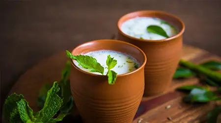 Buttermilk Drink  Fresh buttermilk reduces acidity after meals.