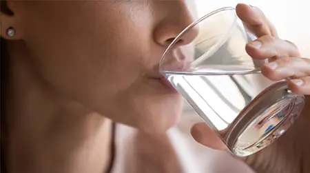 Stay Hydrated: Drinking enough water helps balance stomach acid levels.
